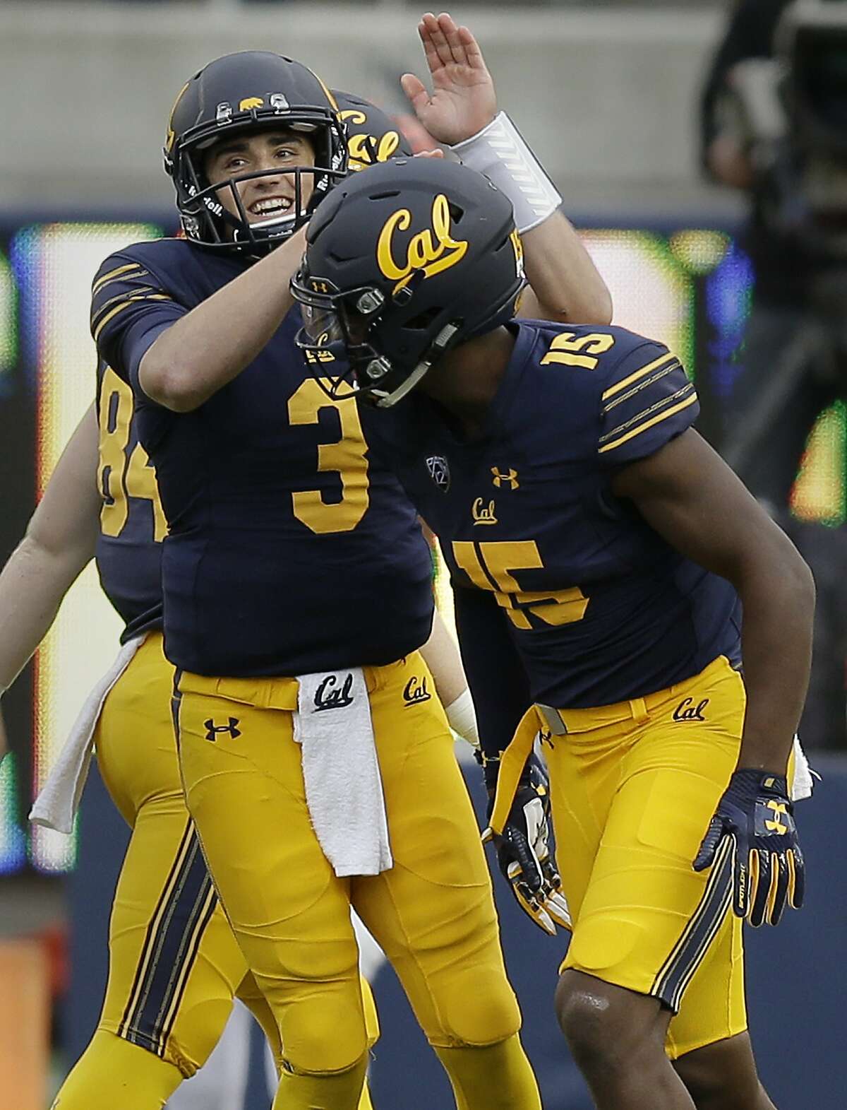 California quarterback Ross Bowers (3) celebrates a touchdown reception by Jordan Veasy, right, during the second half of an NCAA college football game against Oregon State Saturday, Nov. 4, 2017, in Berkeley, Calif. (AP Photo/Ben Margot)