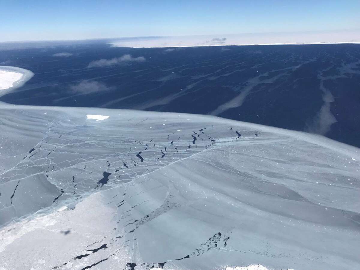 NASA caption: Looking out from the sea ice to iceberg A68, which calved from Antarctica's Larson C ice shelf in July.