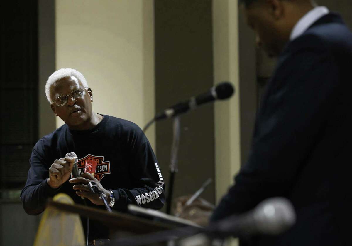 Joe Linson (left) speaks Tuesday as members of the National Association for the Advancement of Colored People stop in San Antonio as part of the group’s multicity listening tour. The meeting took place at the Ella Austin Community Center.