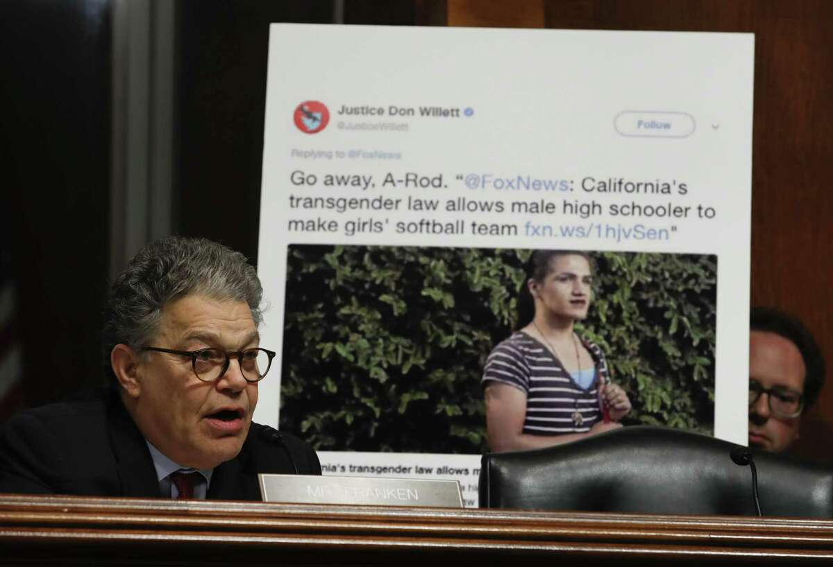 Senate Judiciary Committee member Sen. Al Franken, D-Minn., questions Don Willett and displays a tweet made by Willett during a Senate Judiciary Committee hearing on nominations Wednesday. Don