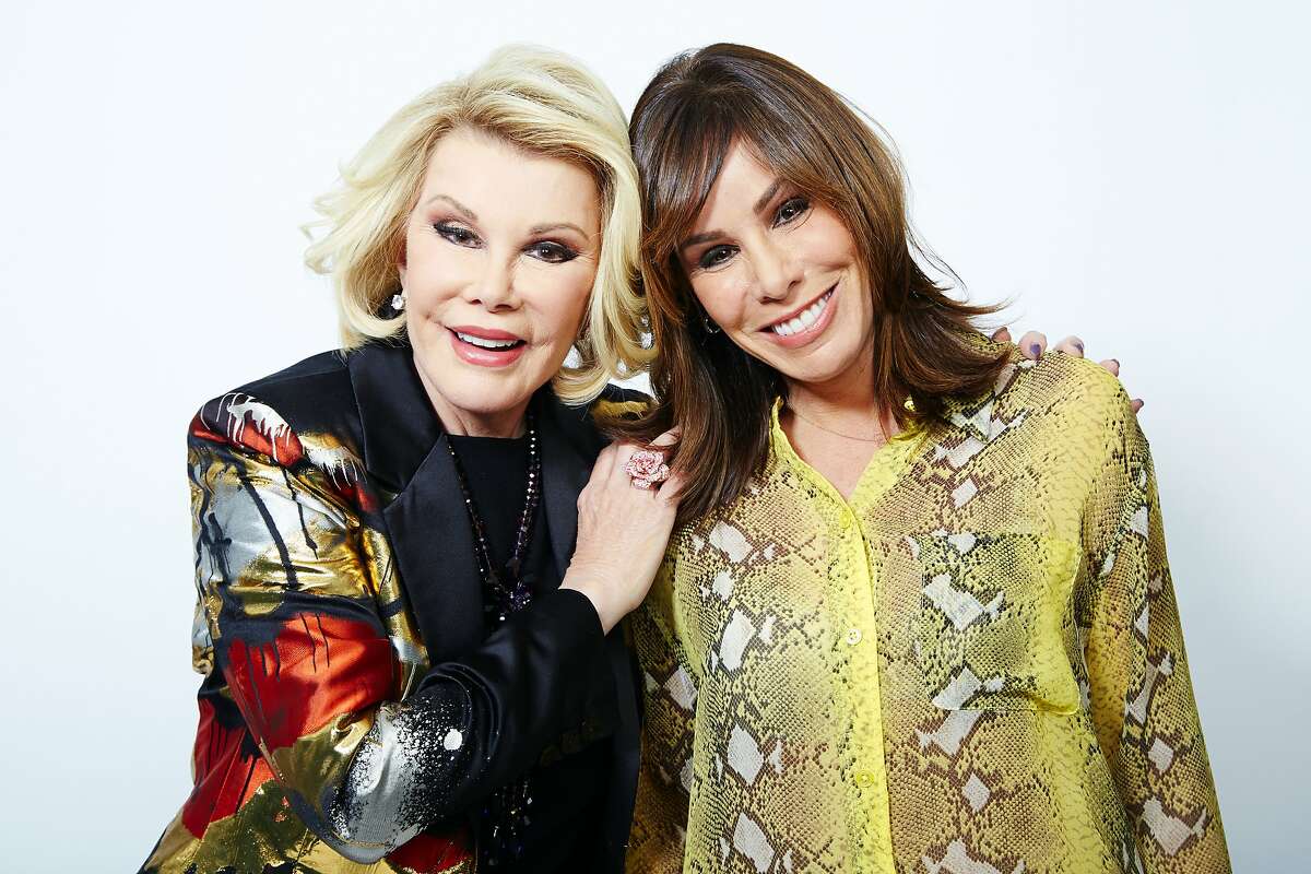 FILE - This Feb. 21, 2013, file photo shows comedian Joan Rivers, left, and her daughter Melissa Rivers in New York. E!�s long-running series, �Fashion Police,� will come to an end next month with a special finale episode on Nov. 27, 2017, featuring its late host and co-creator Joan Rivers. (Photo by Dan Hallman/Invision/AP, File)