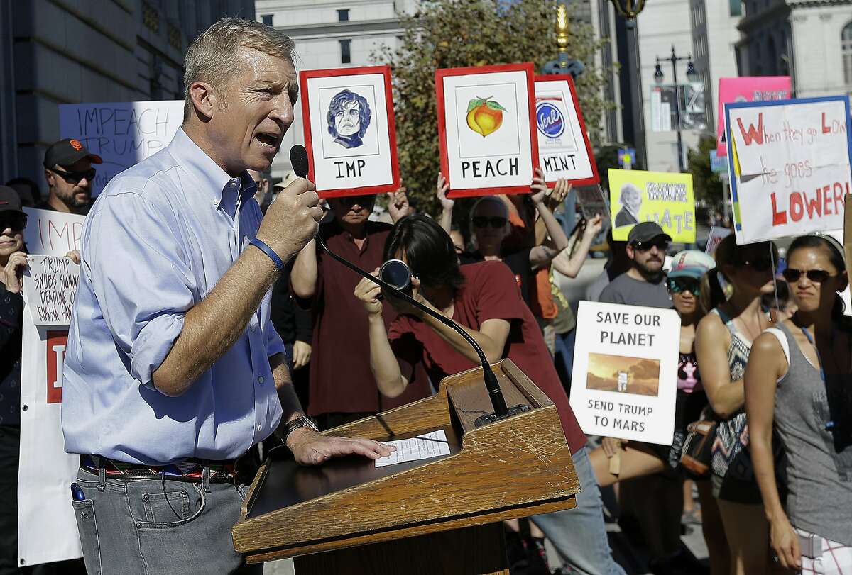 FILE - In this Oct. 24, 2017 file photo, Tom Steyer speaks at a rally calling for the impeachment of President Donald Trump in San Francisco. Steyer is doubling his spending on ads calling for Trump's impeachment to $20 million. (AP Photo/Jeff Chiu, file)