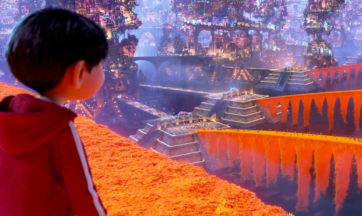 In "Coco," Miguel finds himself in the Land of the Dead, featuring bridges of marigold petals. MUST CREDIT: Walt Disney Pictures-Pixar Animation Studios