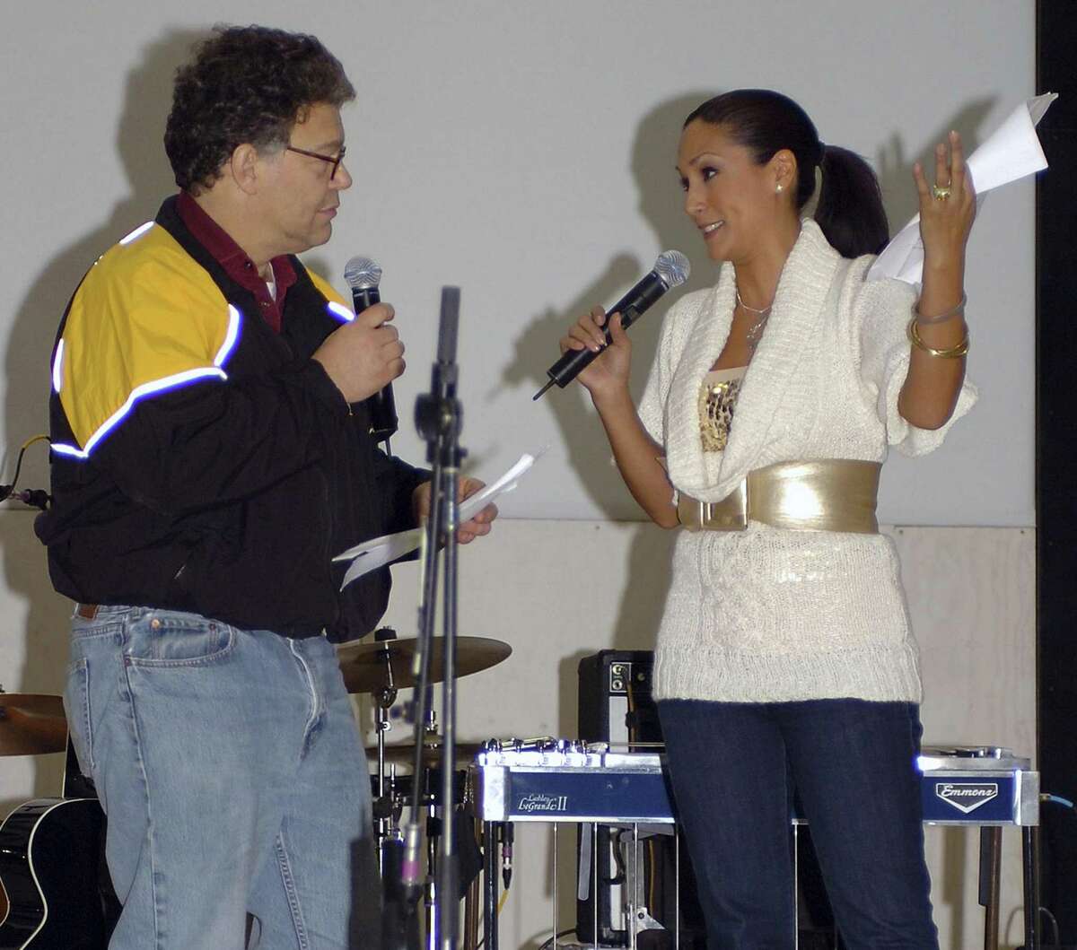 In this image provided by the U.S. Army, then-comedian Al Franken and sports commentator Leeann Tweeden perform a comic skit at Forward Operating Base Marez in Mosul, Iraq, on Dec. 16, 2006, during the USO Sergeant Major of the Army's 2006 Hope and Freedom Tour. Sen. Al Franken, D-Minn., apologized Nov. 16, 2017, after Tweeden accused him of forcibly kissing her during the 2006 USO tour. Colleagues, including fellow Democrats, urged a Senate ethics investigation. Tweeden also accused Franken of posing for a photo with his hands on her breasts as she slept, while both were performing for military personnel two years before the one-time comedian was elected to the Senate. (Creighton Holub/U.S. Army via AP)