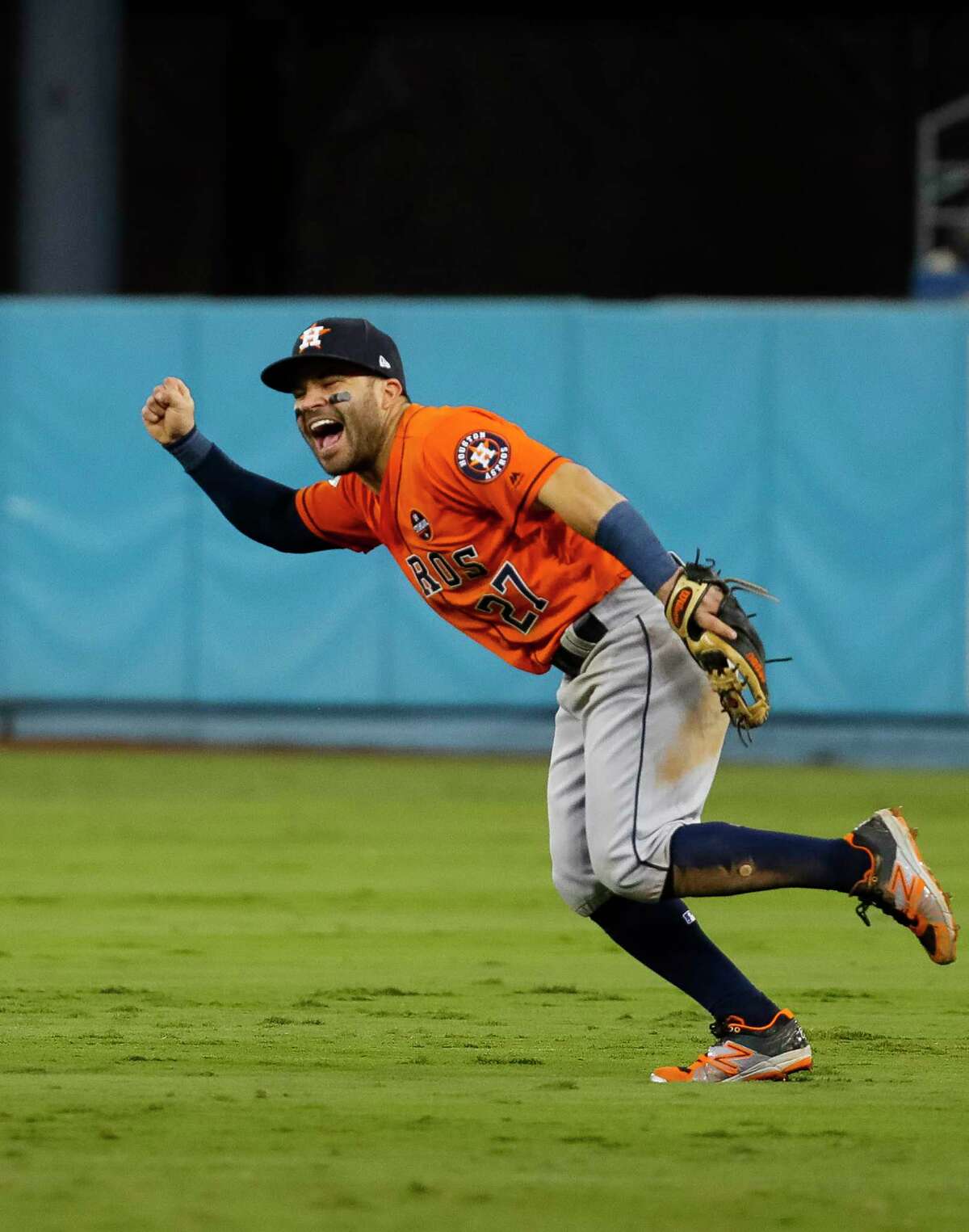Houston Astros second baseman Jose Altuve (27) celebrates the Astros 5-1 win over the Los Angeles Dodgers after throwing the final out of Game 7 of the World Series at Dodger Stadium on Wednesday, Nov. 1, 2017, in Los Angeles. ( Karen Warren / Houston Chronicle )