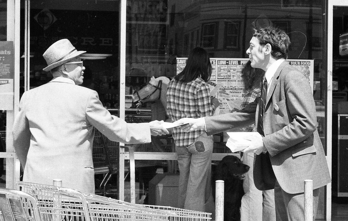 May 21, 1976: Harvey Milk passes out fliers at a San Francisco Safeway grocery store during his 1976 State Assembly run.