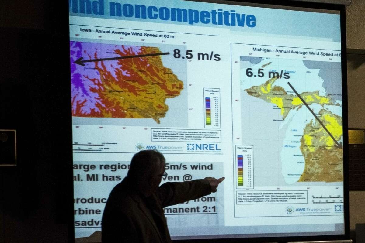 Kevon Martis compares average wind speeds between Iowa and Michigan during a wind energy informational meeting sponsored by Ingersoll Township Concerned Citizens, on Thursday at Bullock Creek High School (Danielle McGrew Tenbusch/for the Daily News)