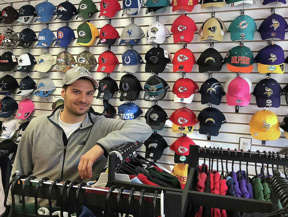 Sal Paladino of East American Sports in his store on South Street in Danbury.