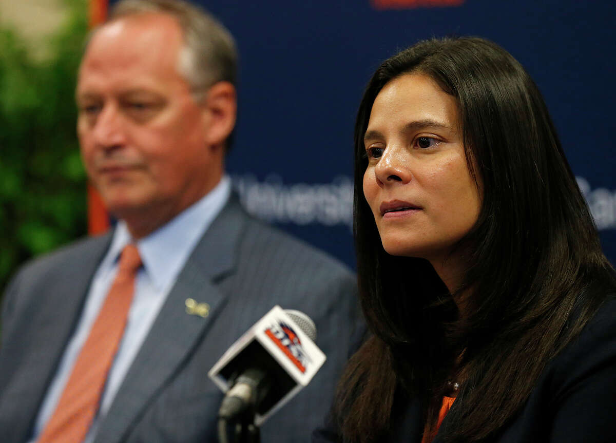 UTSA's new athletics director Lisa Campos speaks during a press conference held Friday Nov. 17, 2017 at the campus. UTSA president Taylor Eighmy is pictured in background.