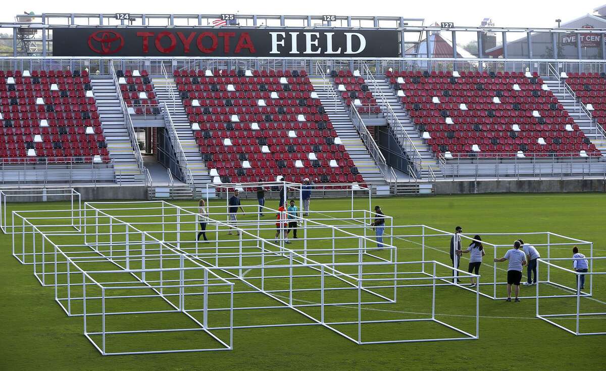 Volunteers put a framework of PVC pipe together Friday November 17, 2017 at Toyota Field in an effort to build the world's largest blanket fort. The fort is being built for the Autism Uncovered community event created to bring awareness to the importance of early intervention and the need for autism services in San Antonio. After the event, the blankets will be donated to Haven for Hope and the PVC pipe will be donated to Habitat for Humanity. Proceeds for the event on Saturday November 18, 2017 will benefit the Autism Treatment Center.