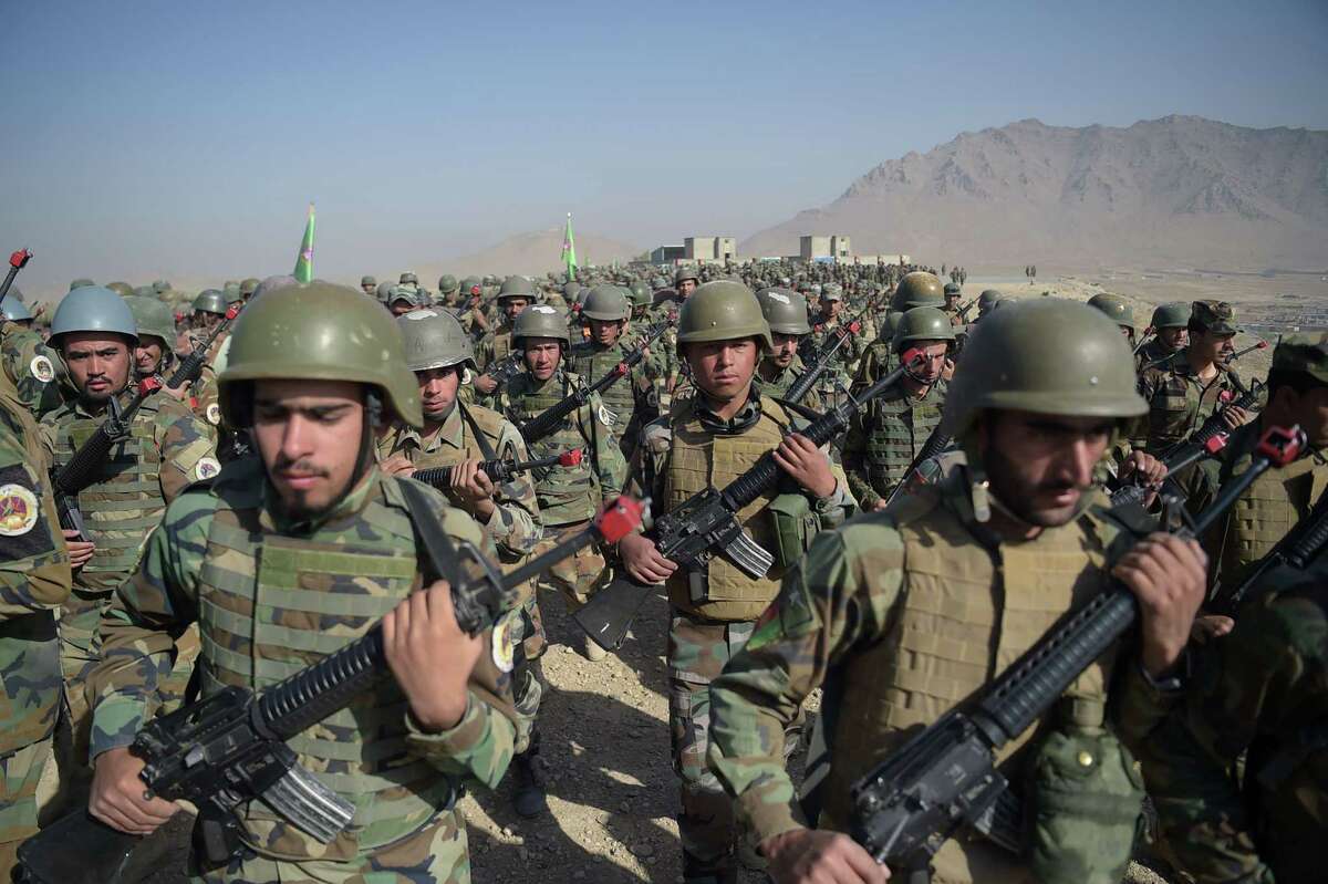 Afghan National Army soldiers march during a military exercise at the Kabul Military Training Center in Afghanistan last month. More than 150 Afghan military personnel sent to the U.S. for training since 2005 have gone AWOL, including 60 from Joint Base San Antonio.