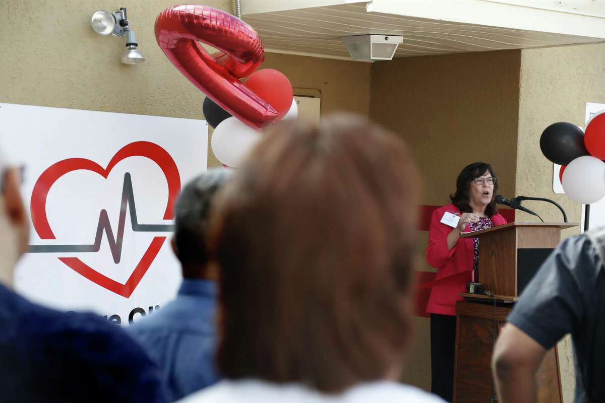 CEO Cynthia Nelson addresses the crowd Friday as San Antonio AIDS Foundation opens an HIV outpatient clinic with a pharmacy on the East Side at 818 E. Grayson Ave.