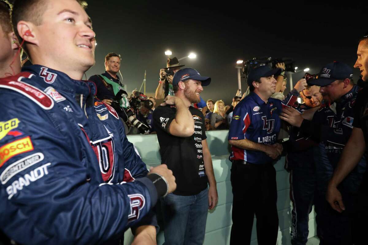 William Byron, left, put a smile on part owner Dale Earnhardt Jr.'s face by winning the Xifinity Series title on Saturday.