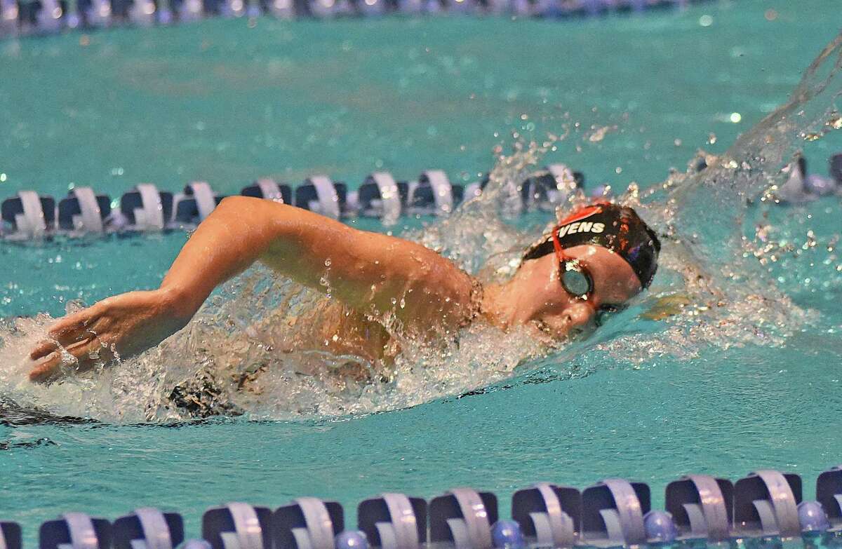 Cheshire's Julia Stevens competes in the fast heat of the 500 freestyle during Saturday's State Open at Yale.