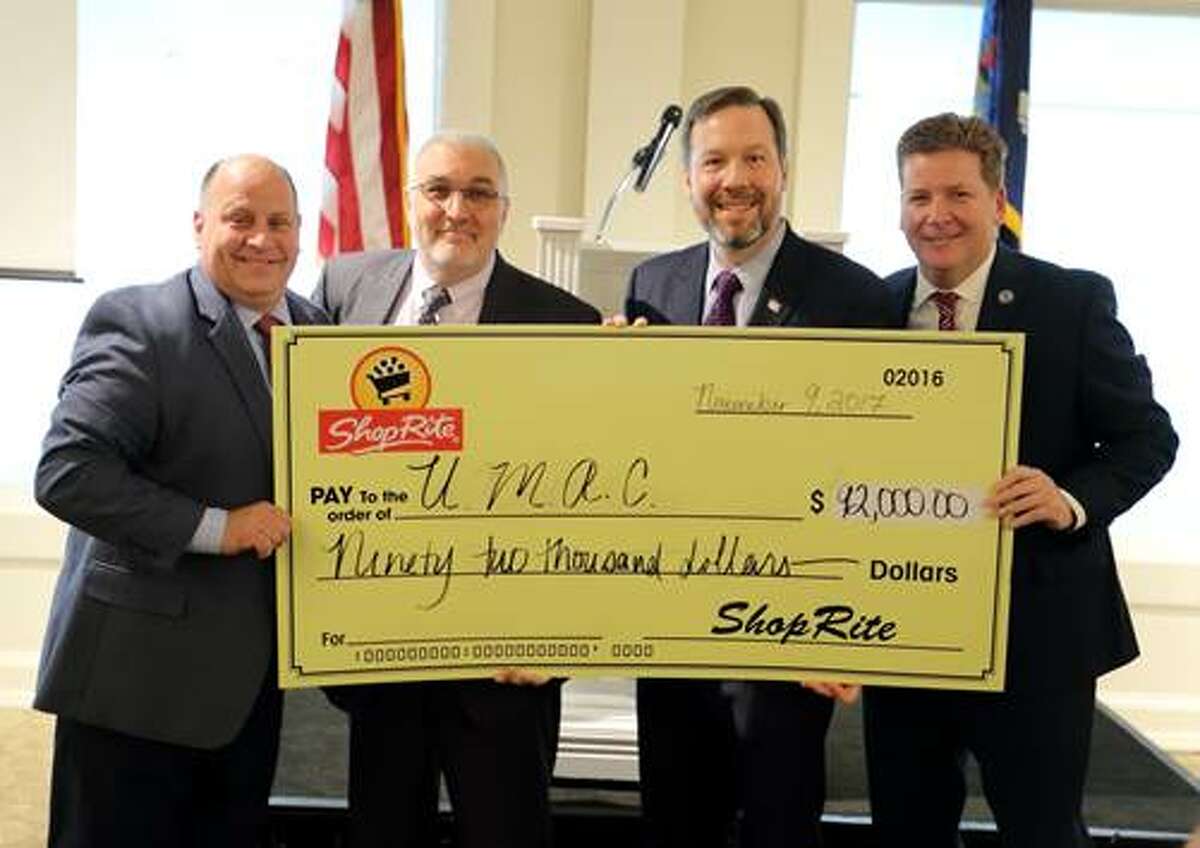 From left, Al Carpenter, district manager, ShopRite Supermarkets, Inc., Ray Gagnon, president, Unified Military Affairs Council, Tom Urtz, vice president of operations, ShopRite Supermarkets, Inc., and Mark Eagan, chief executive officer, Capital Region Chamber. (provided photo)