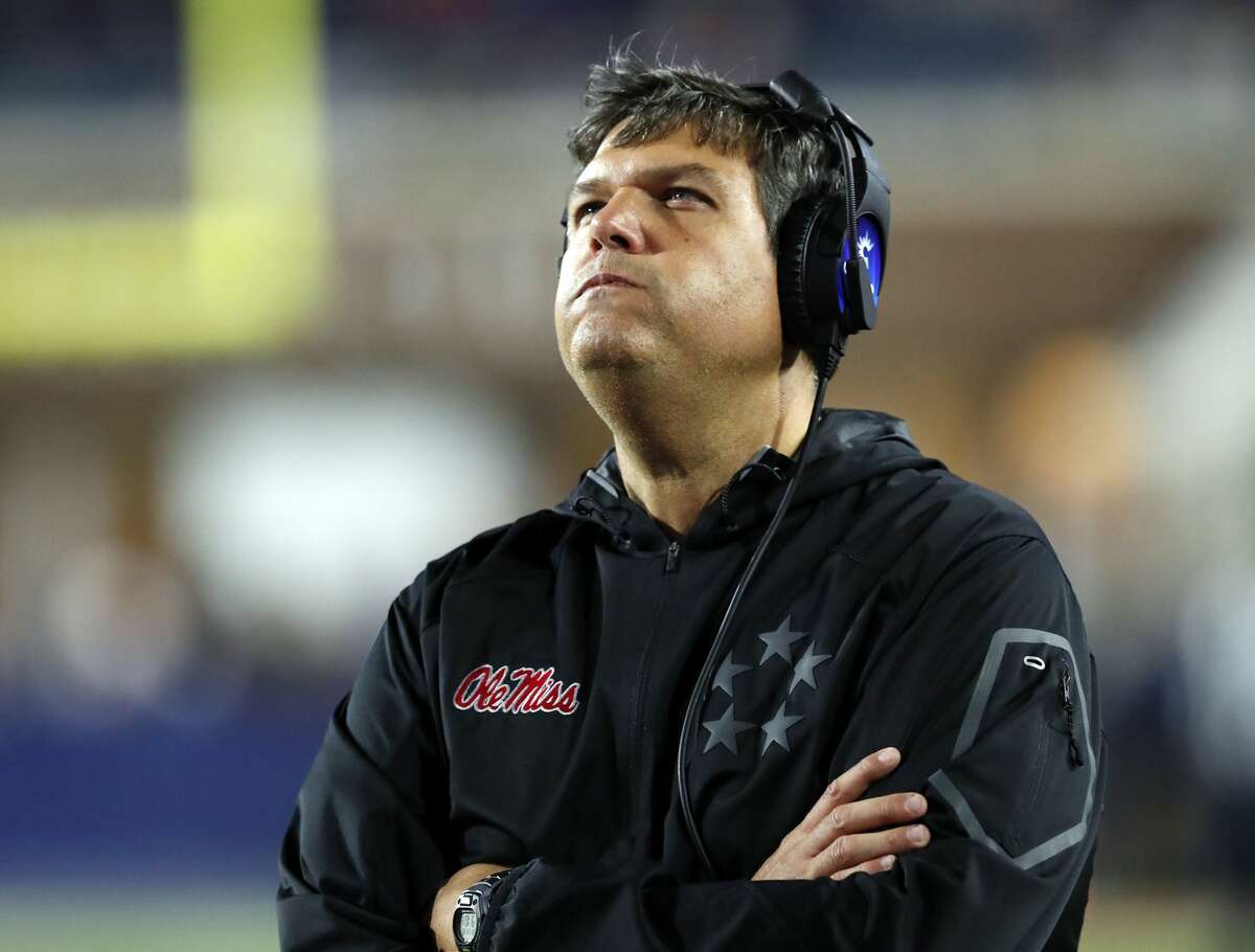 Mississippi head coach Matt Luke looks at the replay of a play on the video board in the final minutes of their NCAA college football game against Texas A&M in Oxford, Miss., Saturday, Nov. 18, 2017. Texas A&M won 31-24. (AP Photo/Rogelio V. Solis)