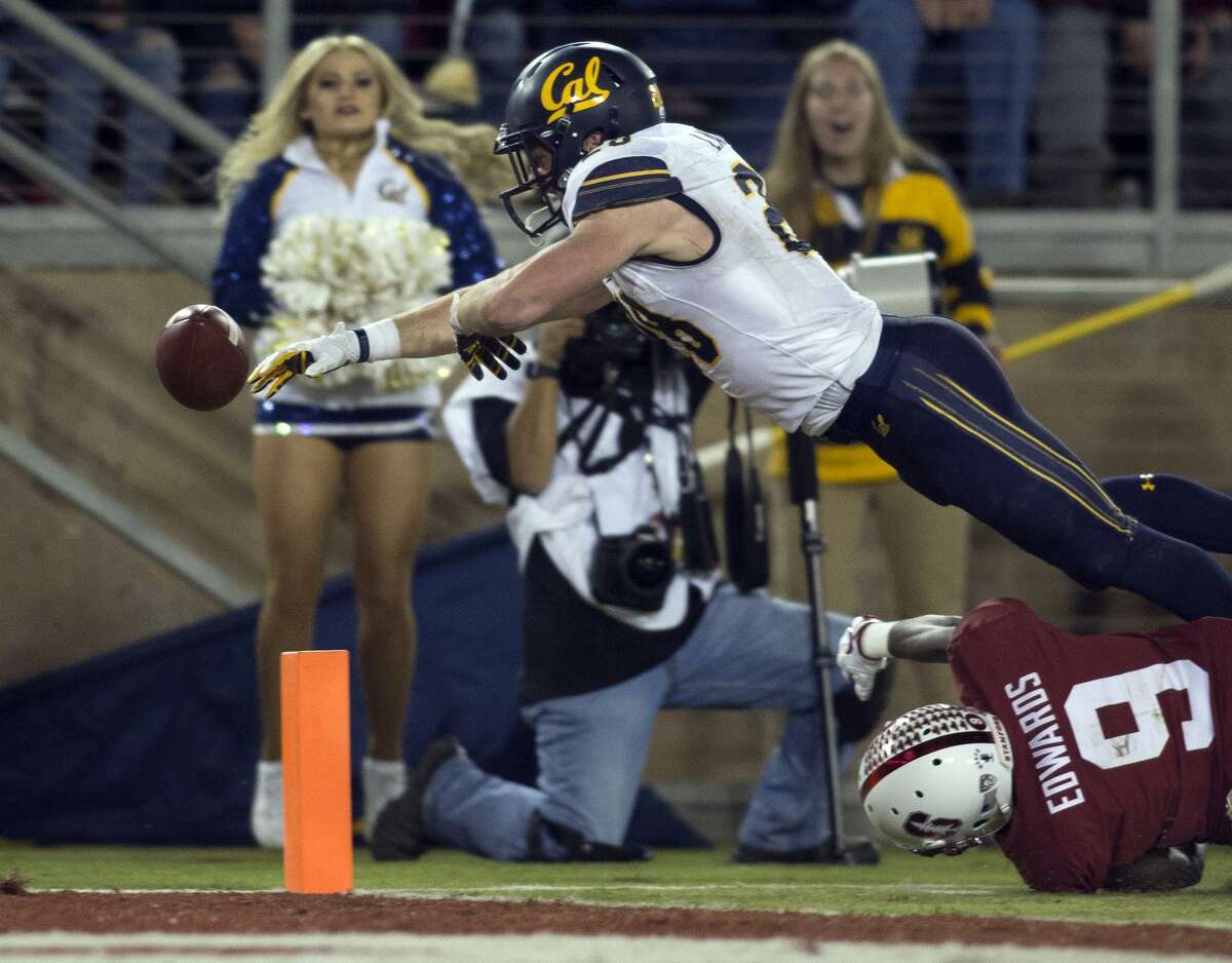 Cal running back Patrick Laird fumbles out of bounds at the one-yard-line as he’s brought down by Stanford’s Ben Edwards.