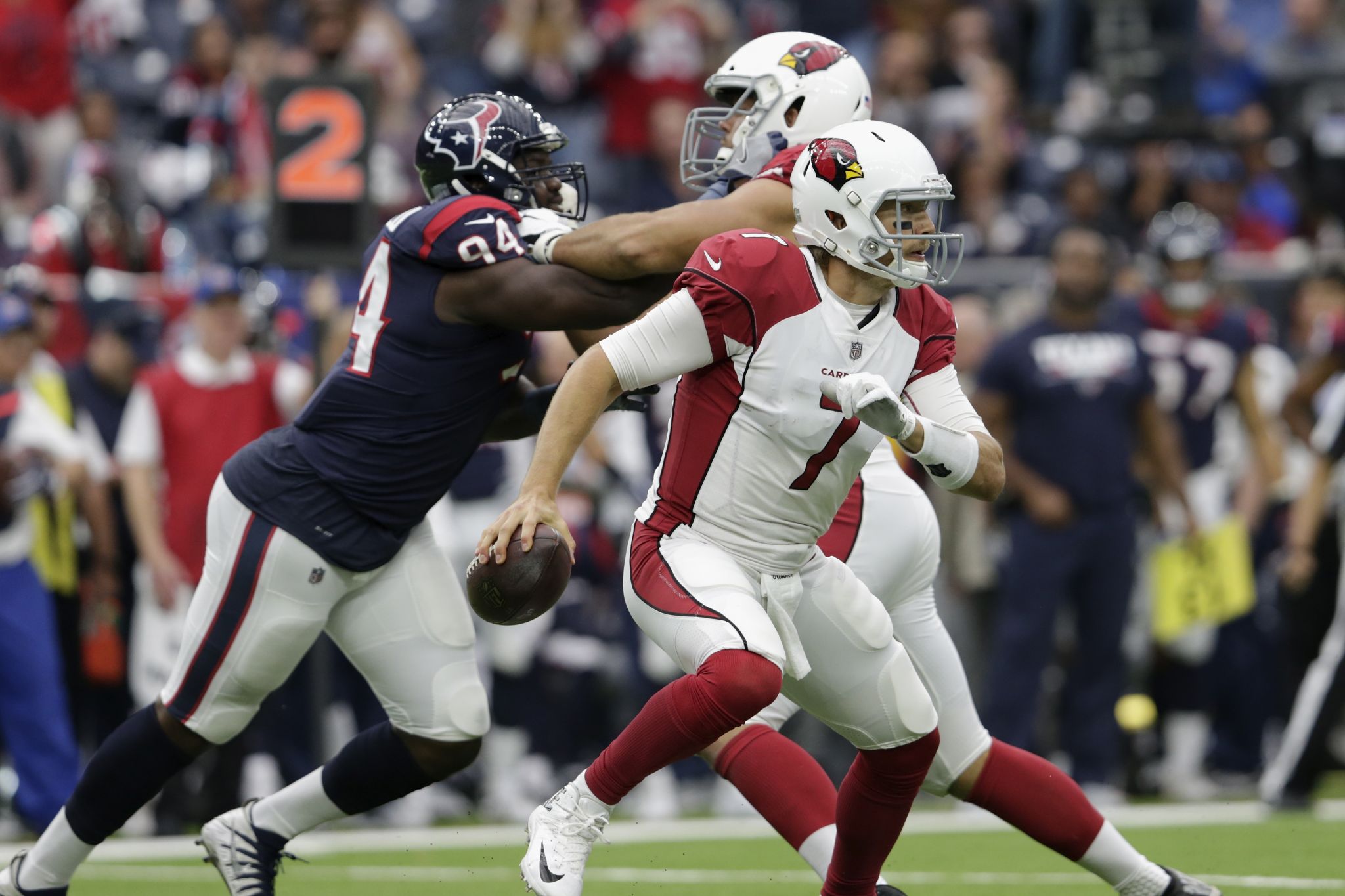 Arizona Cardinals running back Andre Ellington (38) is helped off