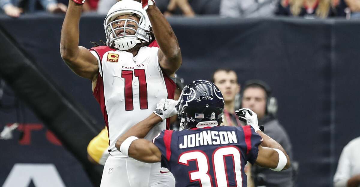Arizona Cardinals wide receiver Larry Fitzgerald (11) goes up over Houston Texans cornerback Kevin Johnson (30) and pulls down a 20-yartd touchdown reception during the second quarter of an NFL football game at NRG Stadium on Sunday, Nov. 19, 2017, in Houston. ( Brett Coomer / Houston Chronicle )