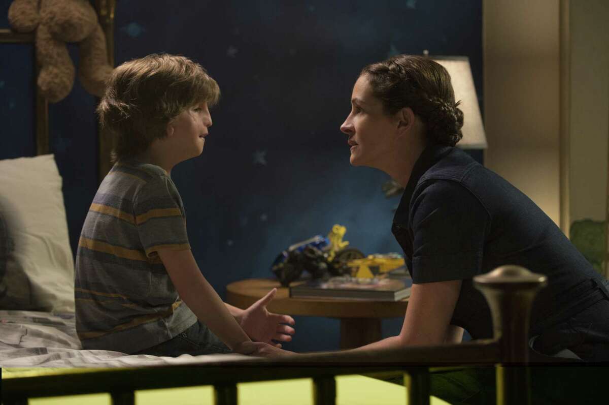 This image released by Lionsgate shows Jacob Tremblay, left, and Julia Roberts in a scene from "Wonder." (Dale Robinette/Lionsgate via AP) ORG XMIT: NYET935