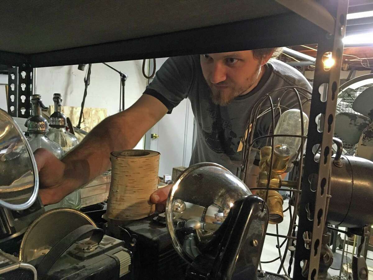 Jason Aleksa collects old lamps, cameras, phones, fans — you name it — with the hopes of converting them to lamps in his Fairfield workspace.