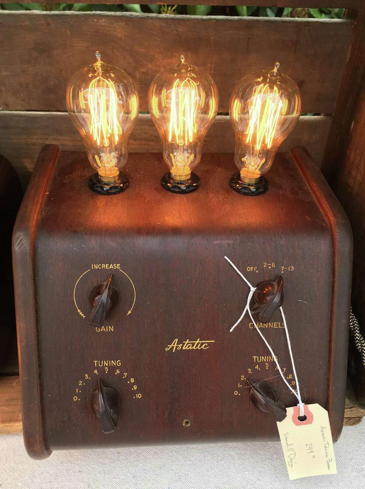 Jason Aleksa, of Fairfield, creates light fixtures out of old objects and appliances.