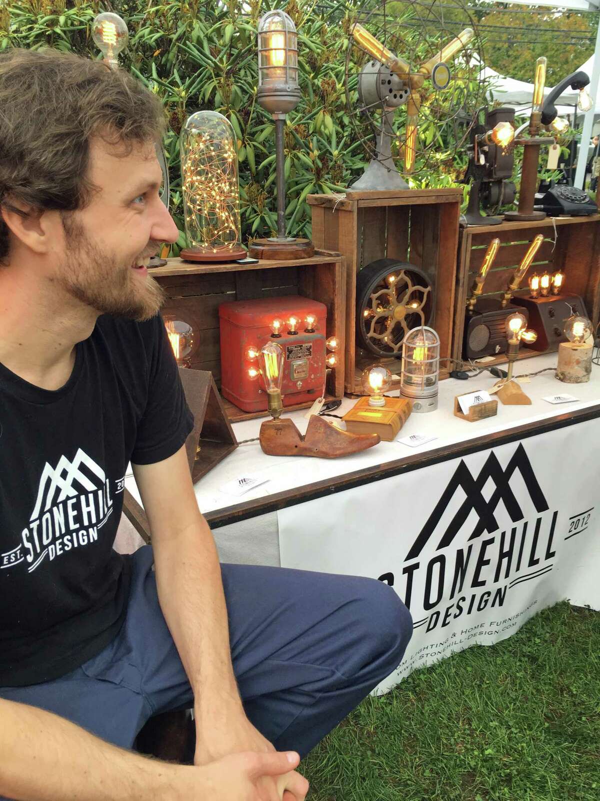 Jason Aleksa, of Fairfield-based Stonehill Design, recently set up a booth at the Fairfield Harvest Market to sell his unusual lamps.