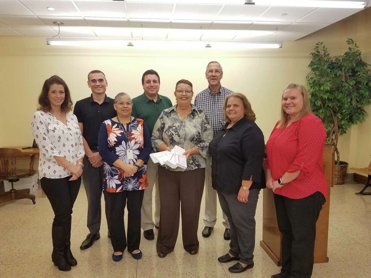 Pictured Left to Right, Front Row: Mandi Bronsell, Commissioner Pct. 1 Office; Brenda Bernander, Lamar CISD Operations Manager; Paulette Shelton, Transportation Director; Lori Allbright, Fort Bend ISD Operations Manager; Sam Hoelscher, First Transit Operations Manager Back Row: Robert Pechukas, Commissioner Pct 3. Office; Jeff Braun, Office of Emergency Management Director; Commissioner James Patterson, Pct. 4