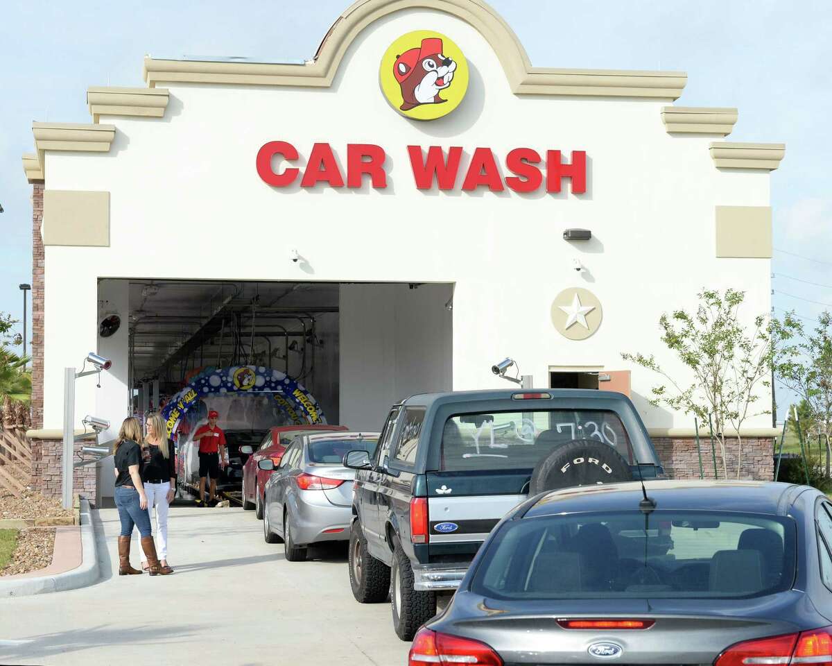 Cars line-up for a free car wash at Buc-ee's in Katy, TX on November 16, 2017.