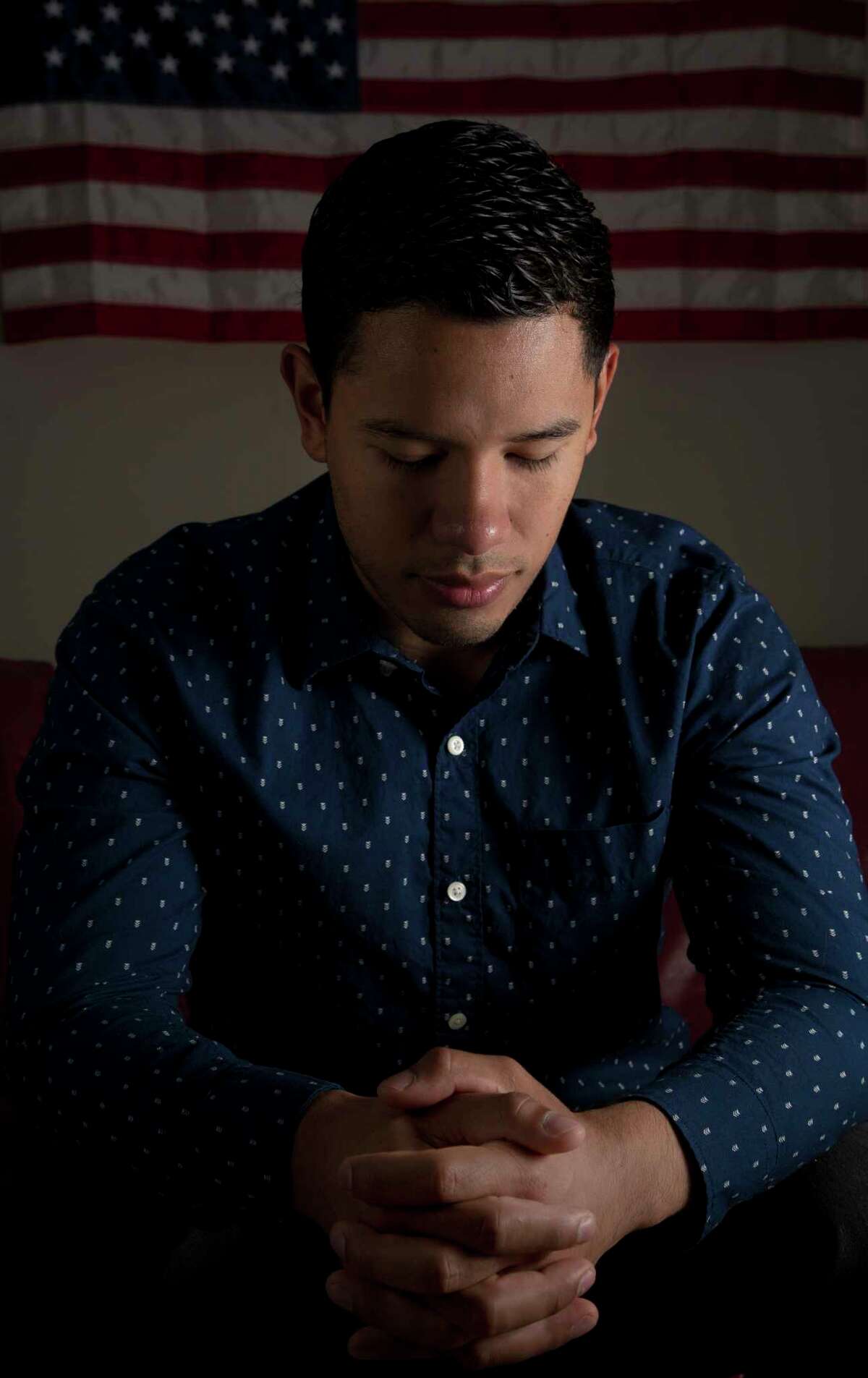 Jesus Contreras, a Deferred Action for Childhood Arrivals recipient, poses for a photograph inside his home Tuesday, Oct. 17, 2017, in Houston. Contreras is a paramedic for the Montgomery County Health Department and worked long hours during Tropical Storm Harvey. ( Godofredo A. Vasquez / Houston Chronicle )