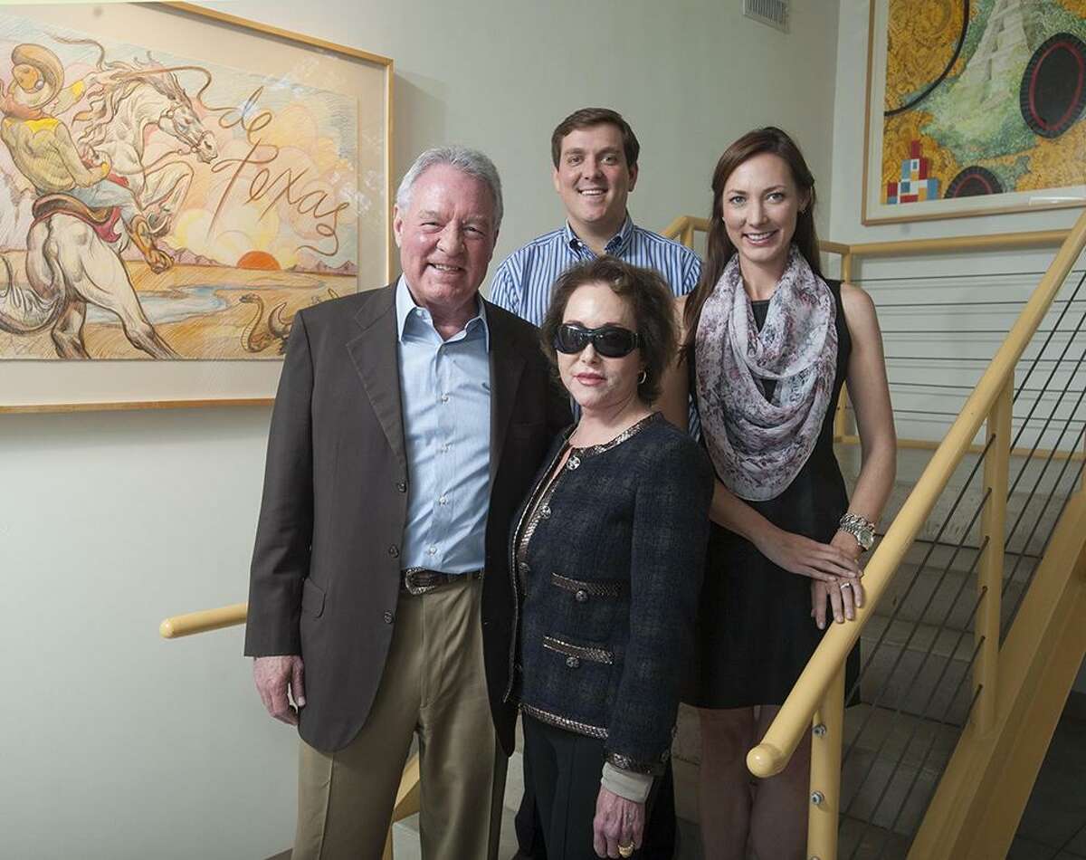 Peter M. Holt, CEO of Holt Cat and Spurs Sports & Entertainment, and his wife, Julianna Hawn Holt, and their children, Peter J. Holt and Corinna Holt Richter, at the Holt company headquarters on Tuesday, Sept. 24, 2013.