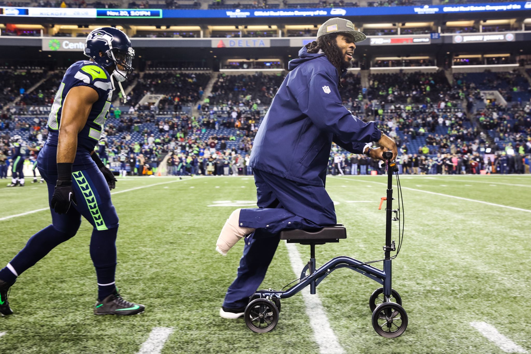 Richard Sherman Rides A Scooter On Seahawks Sideline