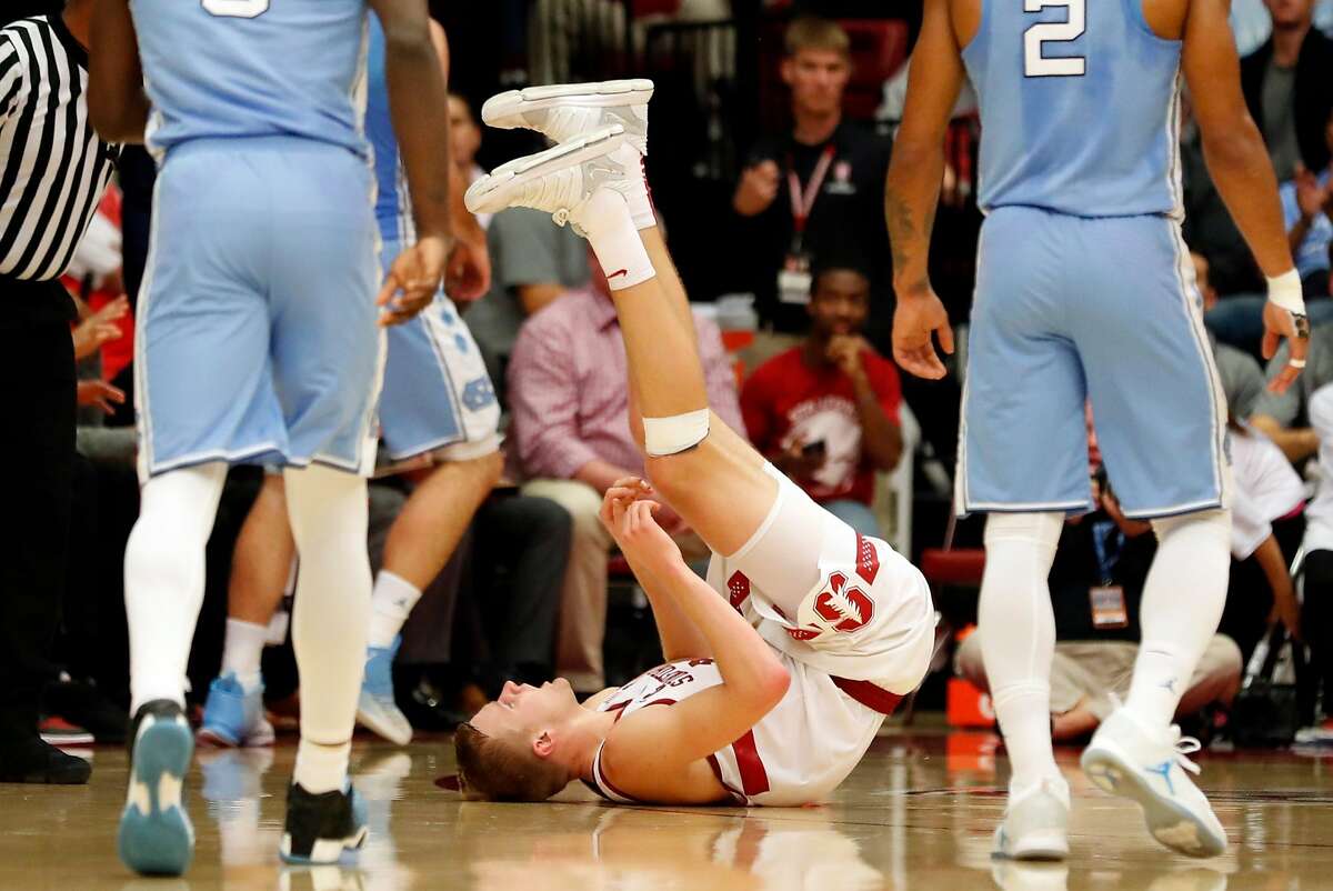 Stanford's Michael Humphrey ends up on his back after chasing a rebound during 1st half against North Carolina during Men's college basketball game at Maples Pavilion in Stanford, Calif., on Monday, November 20, 2017.