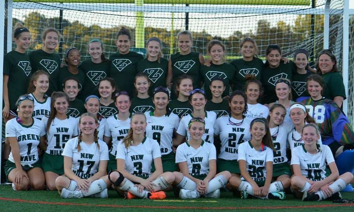 The New Milford Varsity Field Hockey team showed support for the freshman squad this season, wearing their Z shirts to honor Coach Fran Zaloski. The freshmen played the game. Upperclassmen were ball girls, coaches, announcers, etc.