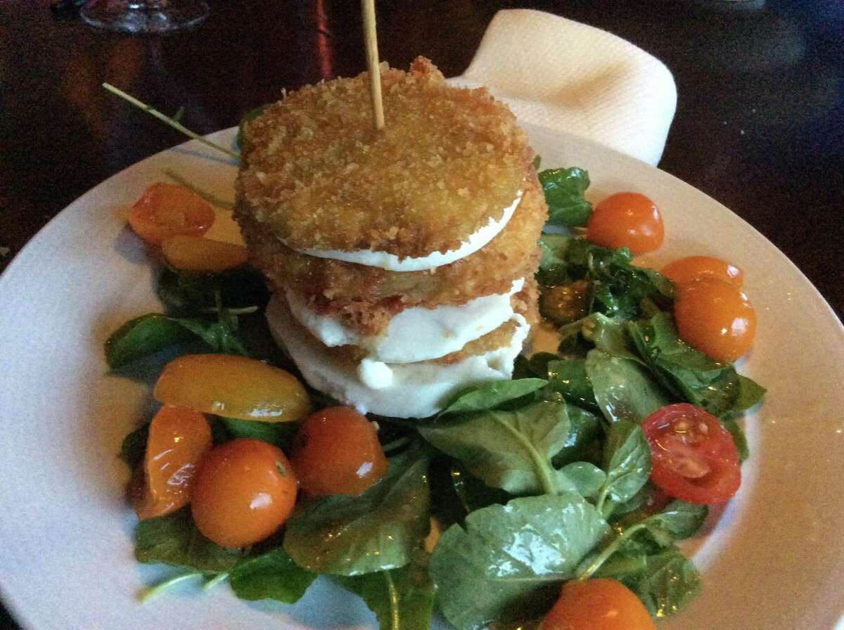 Sunset Terrace at the Grove Park Inn is the iconic spot for dinner in Asheville. The Terrace Tomato and Mozzarella; perfectly fried green tomatoes sandwiching fresh mozzarella and served with arugula, cherry tomatoes and lemon grass vinaigrette is the perfect starter to  memorable dinner.