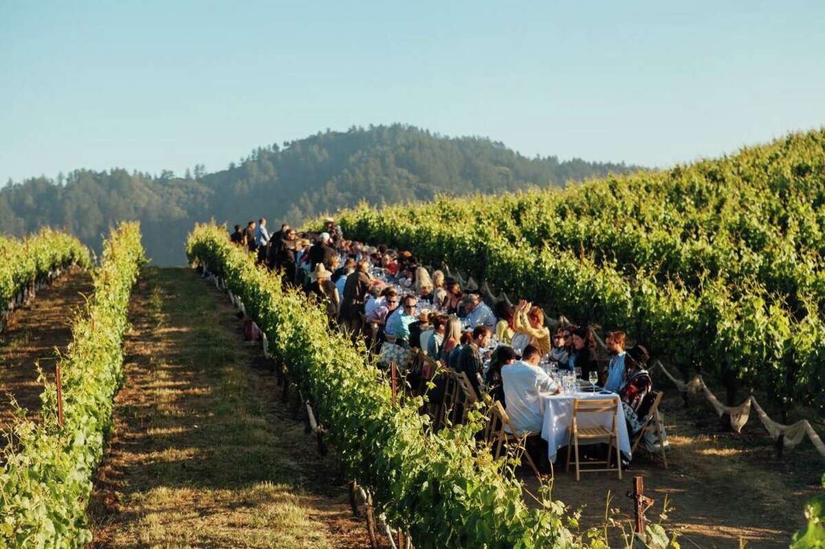 Outstanding in the Field sets up long tables at rural farms in vineyards and right at the ocean side, bringing diners close to the food source.