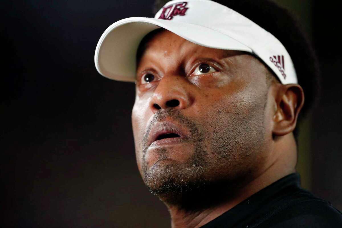 Texas A&M head coach Kevin Sumlin looks at the scoreboard prior to an NCAA college football game against Mississippi in Oxford, Miss., Saturday, Nov. 18, 2017. (AP Photo/Rogelio V. Solis)