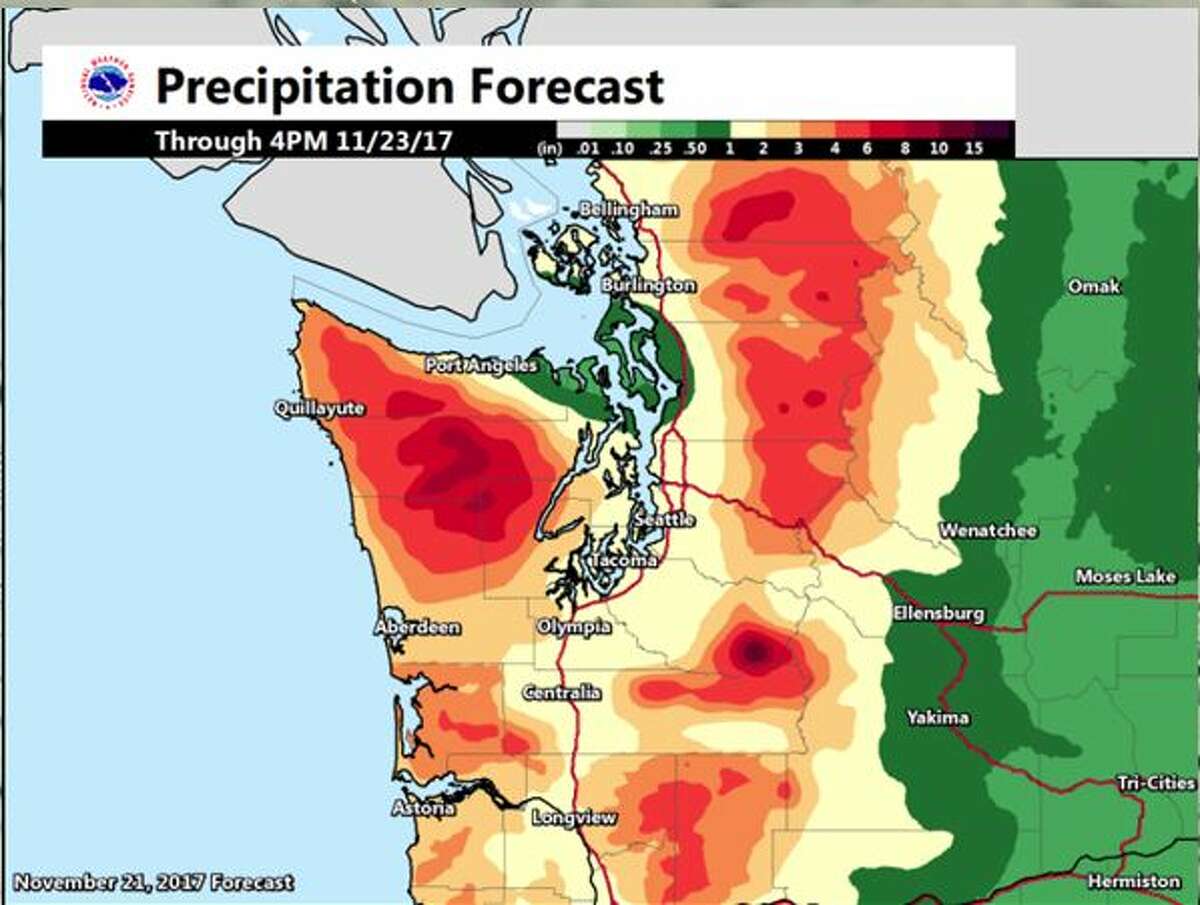 Flooding still expected as warm rains douse Seattle area