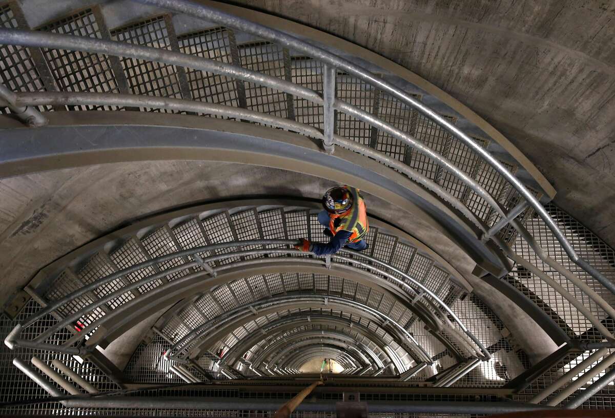 Field operations manager John Rocca climbs a staircase inside the new intake tower of the Calaveras Dam replacement project near Sunol, Calif. on Tuesday, Nov. 14, 2017. The SFPUC is replacing the original seismically unreliable dam, which was completed in 1925, with a 220-foot high rock and earthen dam.