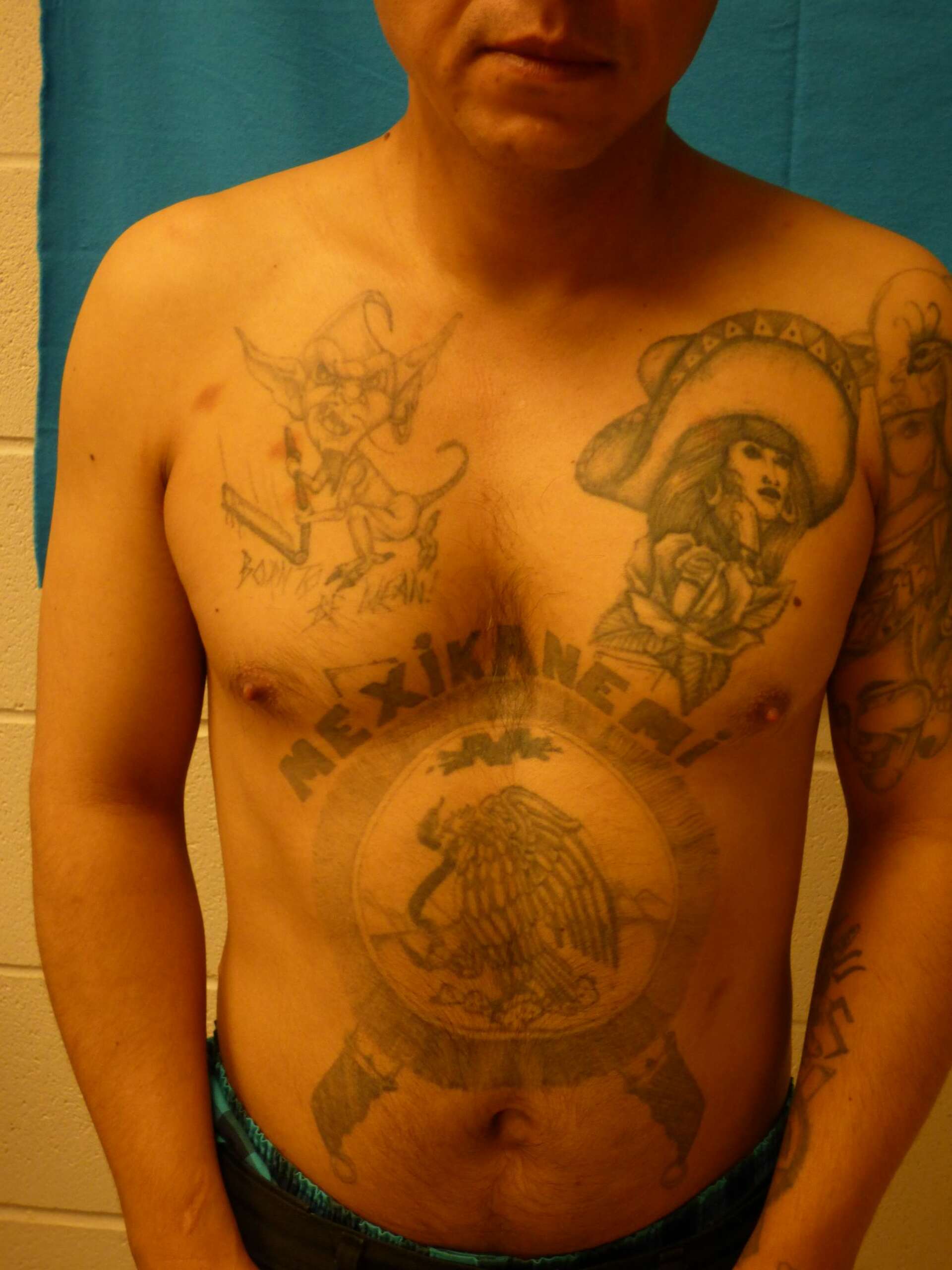 Tattoos on 3 men picked up by Border Patrol give away