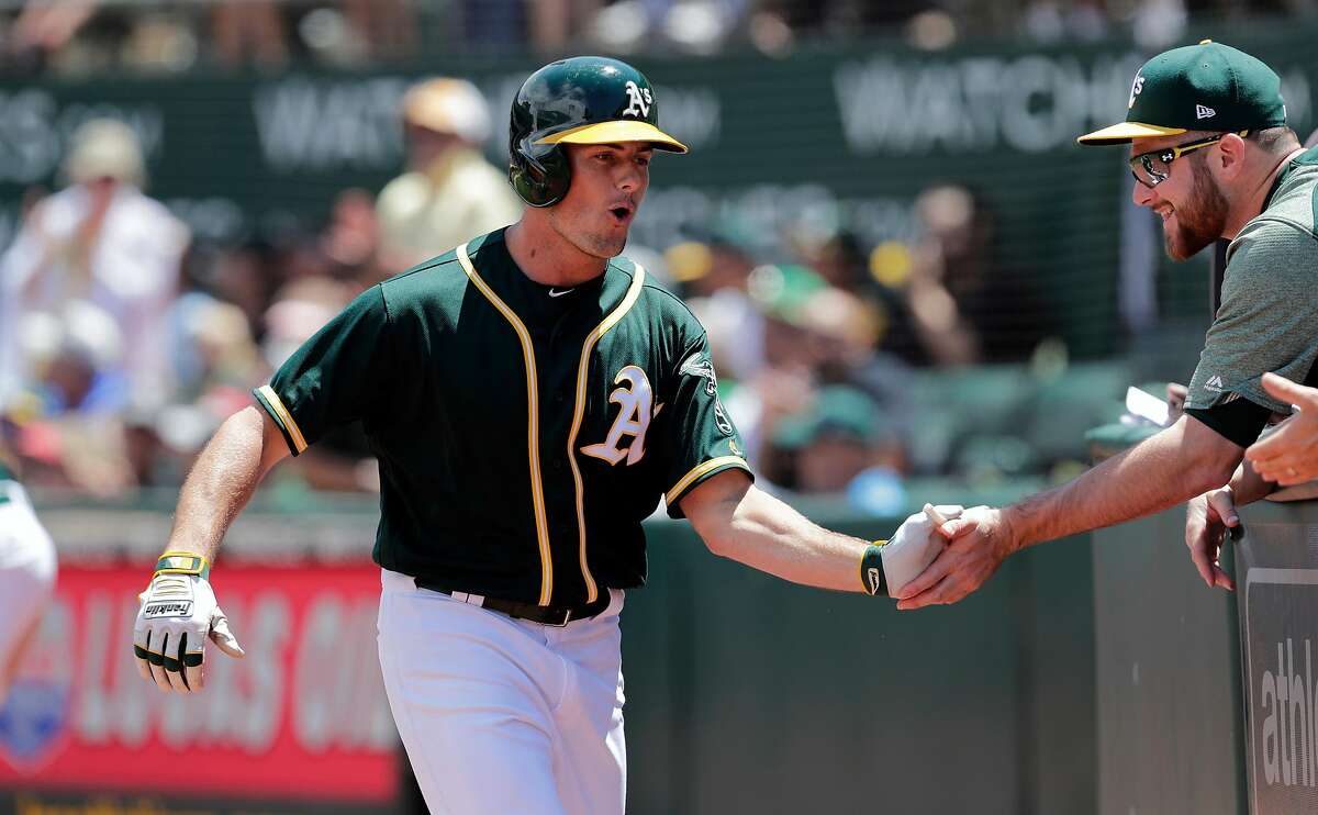 A's Jaycob Brugman after a solo home run in the 4th inning, as the Oakland Athletics take on the Chicago White Sox at the Oakland Coliseum on Wednesday July 5, 2017, in Oakland, Ca.