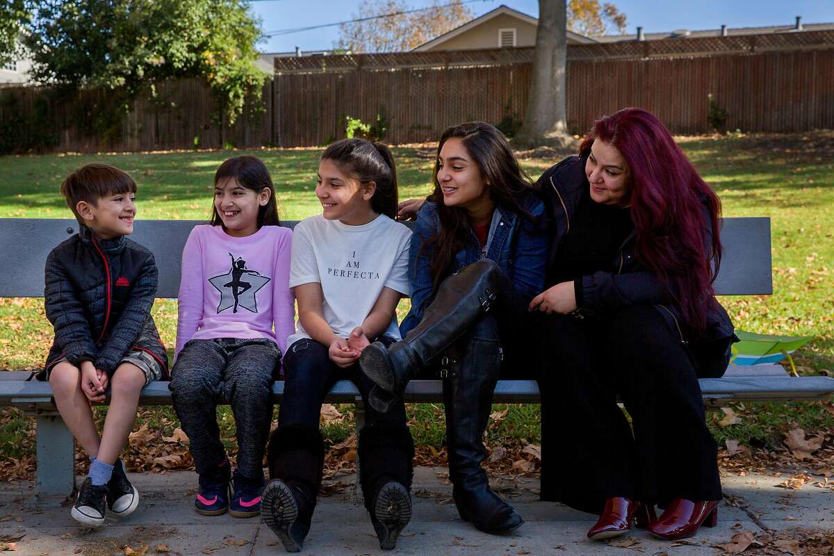 From left: Danyal Nasseri, 7, with his siblings Iman, 9, Jennah, 12, Diana, 14, and mother Habiba at the park on Saturday, Nov. 18, 2017, in Santa Clara, Calif. Habiba participated in a study to share her genetic data with UCSF and Color Genomics.