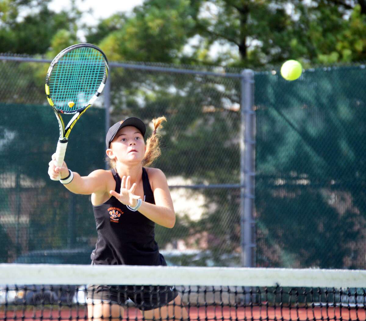 Edwardsville senior Grace Desse returns a shot during the Class 2A Edwardsville Sectional at the EHS Tennis Center on Oct. 14.