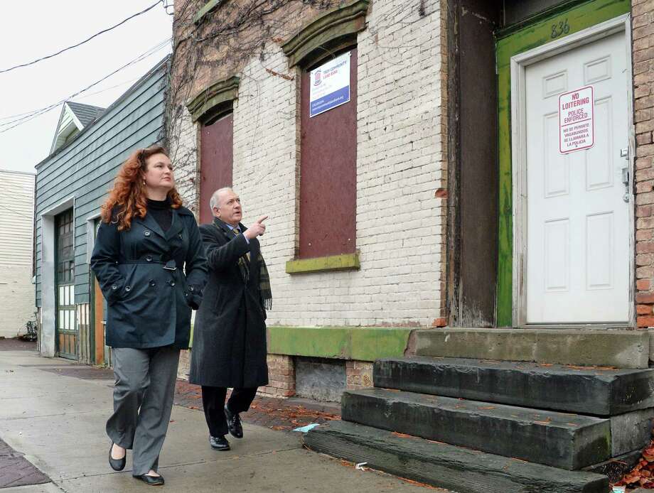 Heather King and Tony Tozzi of the Troy Land Bank at one of their properties at 836 River Street Thursday Nov. 16, 2017 in Troy, NY.  (John Carl D'Annibale / Times Union) Photo: John Carl D'Annibale / 20042111A