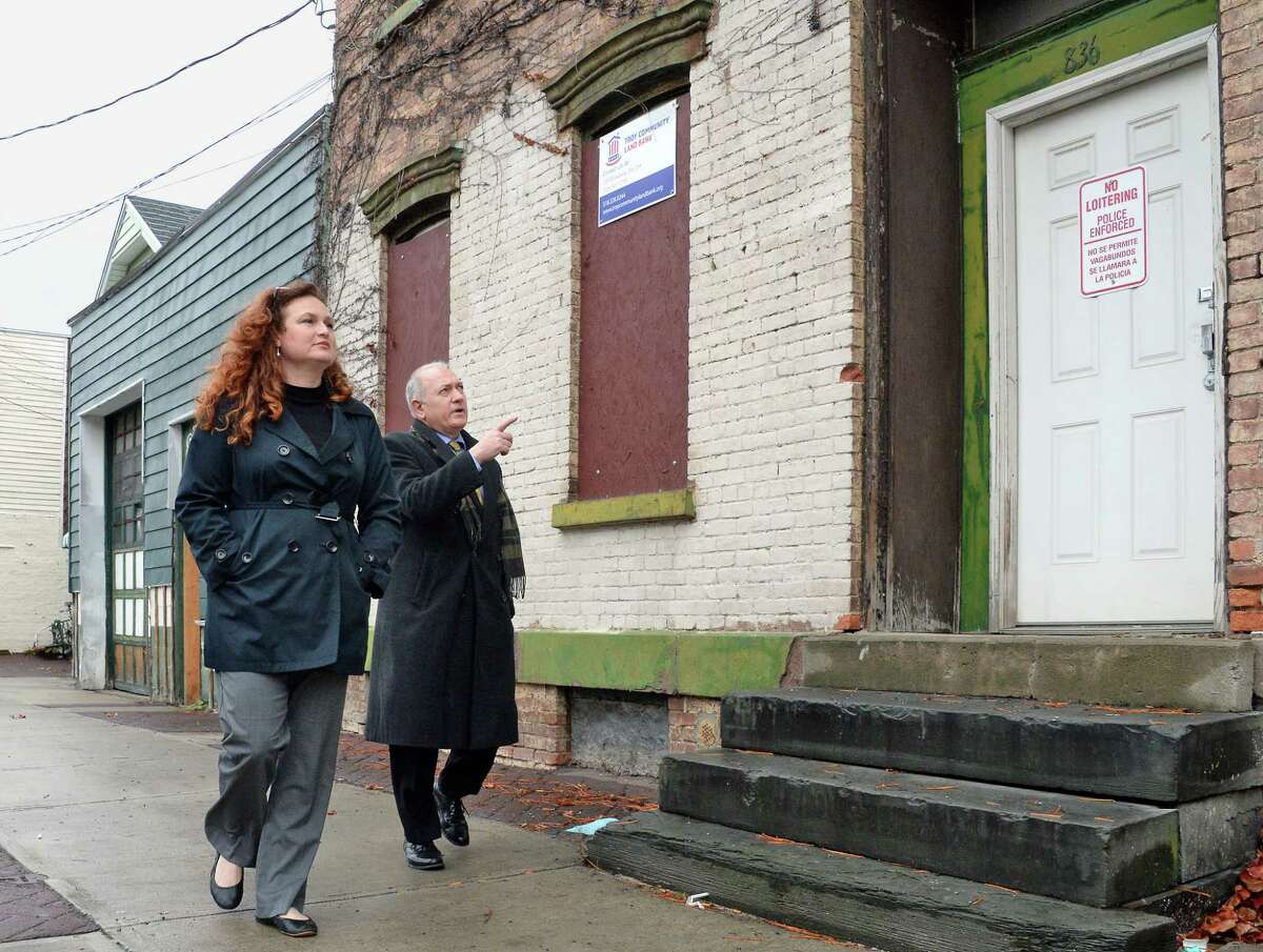 Heather King and Tony Tozzi of the Troy Land Bank at one of their properties at 836 River Street Thursday Nov. 16, 2017 in Troy, NY. (John Carl D'Annibale / Times Union)