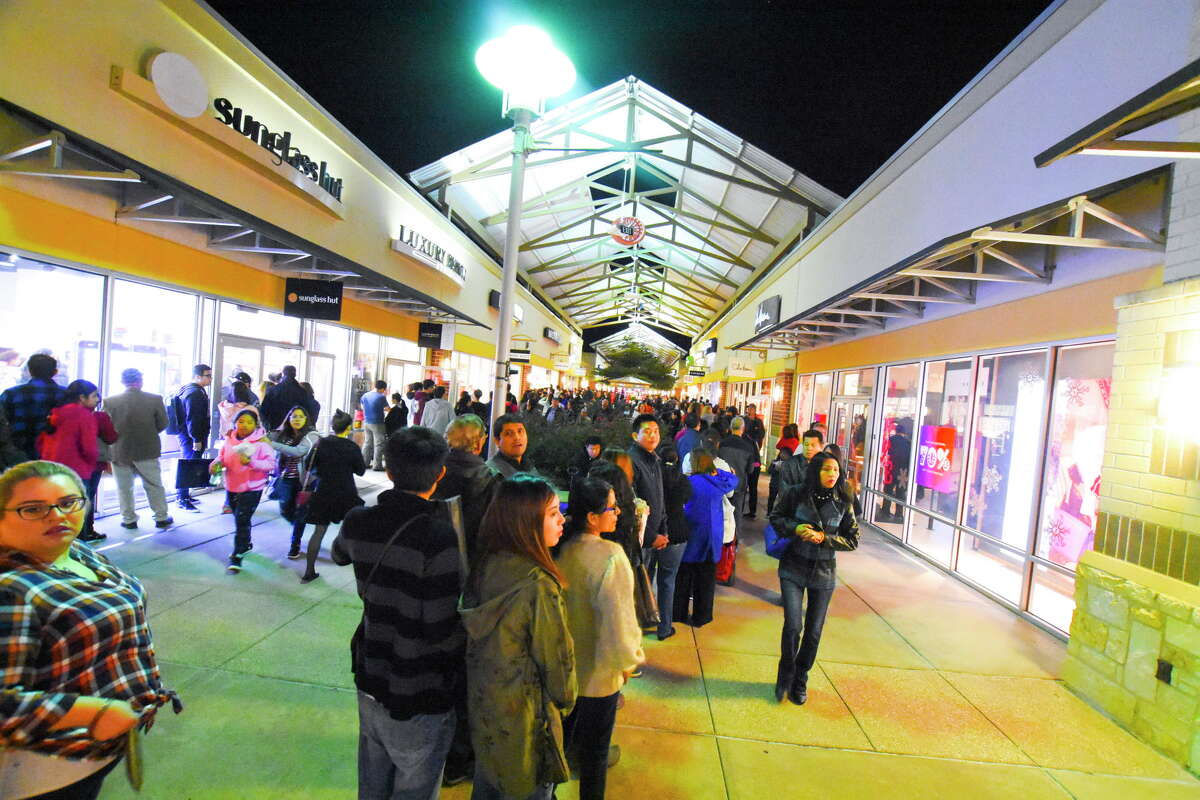 Fewer shoppers swarm stores this Black Friday morning