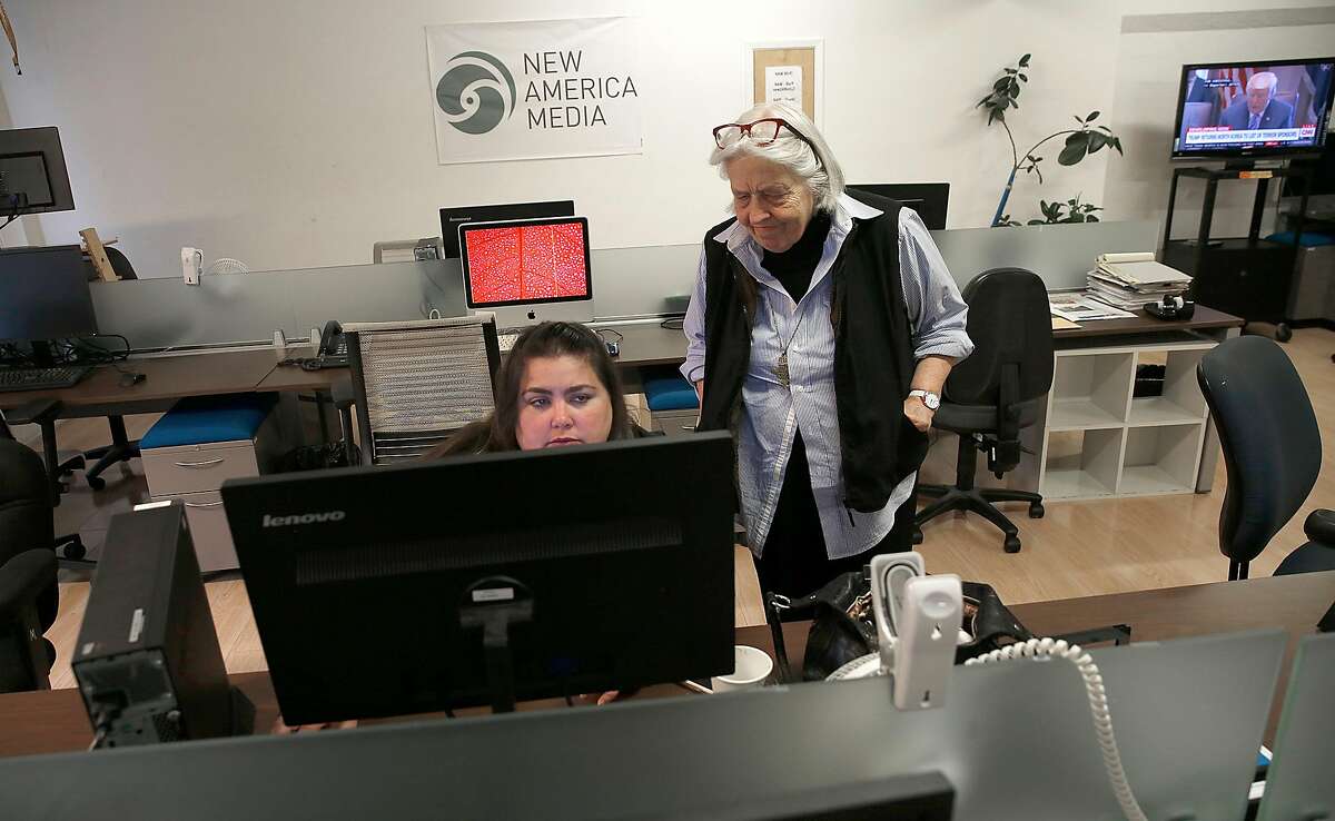 Longtime executive editor Sandy Close (right) and marketing associate Dana Levine (middle) at the New America Media office on Monday, November 20, 2017, in San Francisco, Calif. Pacific News Service and its offshoot New America Media will close at the end of the month, after nearly a half century in the Bay Area.