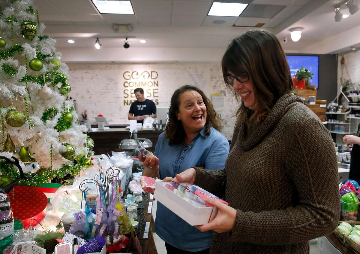 Shari Liebman (left) and Candice McGraw shop in the locally-owned Good Common Sense Naturals during Black Friday sales at Stoneridge Shopping Center in Pleasanton, Calif. on Friday, Nov. 24, 2017.