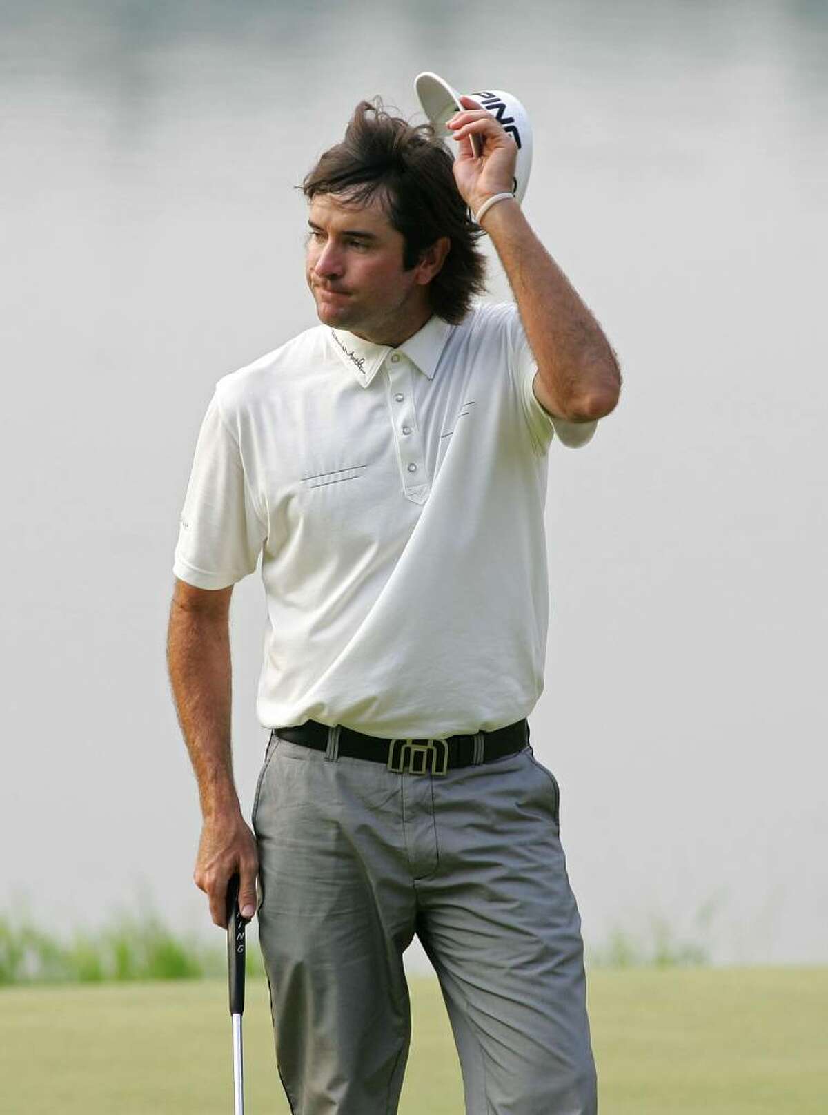 CROMWELL, CT - JUNE 27: Bubba Watson celebrates after winning a two-hole playoff on the 16th green after the final round of the Travelers Championship held at TPC River Highlands on June 27, 2010 in Cromwell, Connecticut. (Photo by Michael Cohen/Getty Images) *** Local Caption *** Bubba Watson