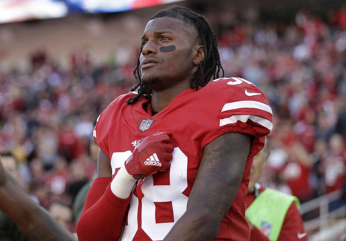 San Francisco 49ers defensive back Adrian Colbert (38) stands during the performance of the national anthem before an NFL football game against the New York Giants in Santa Clara, Calif., Sunday, Nov. 12, 2017. (AP Photo/Marcio Jose Sanchez)